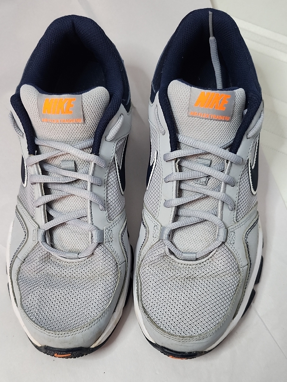 Nike Men’s Light Gray & Navy Athletic Sneakers with Orange Logo